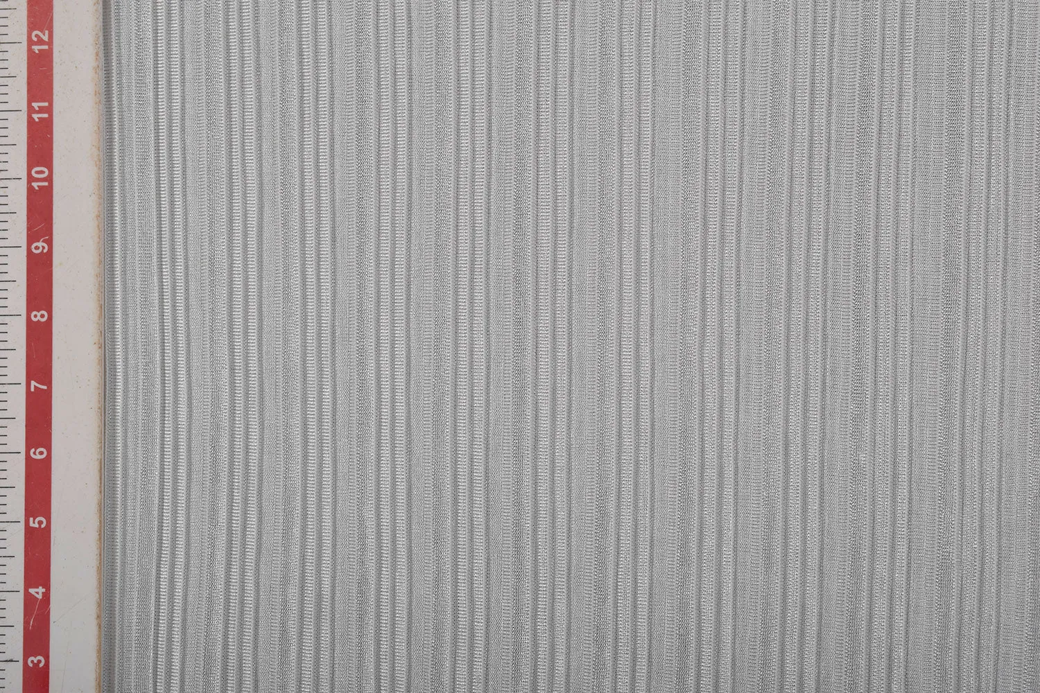 Off White Plain Pleated Knit Fabric